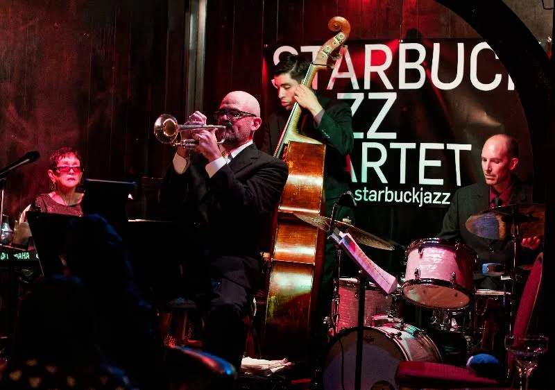 Starbuck Jazz Quartet performing live — trumpet, piano, upright bass, drums